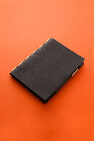Closed dark leather A5 penholder with lifter, smooth cover and beveled corners