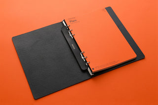 Black leather A5 ring supporter notebook with strap and metal rings, open