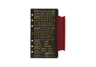 Red-brown leather binder with script-lined insert on the inner cover