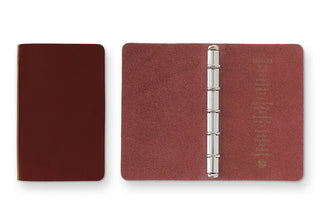 Mini-5 leather binder set: closed dark red cover and open red-brown cover with rings