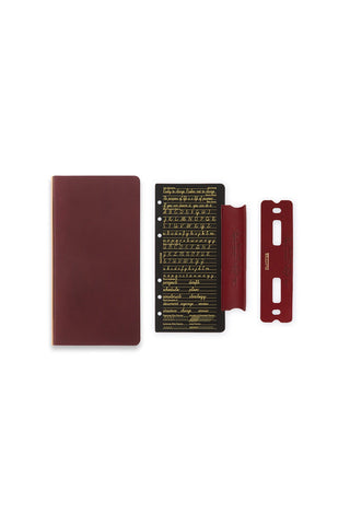 Narrow leather binder, red-brown cover with matching insert card and clips