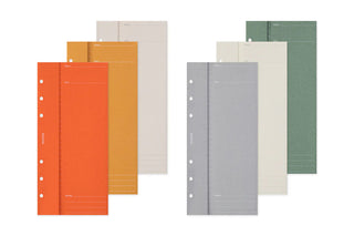 Assorted narrow planner inserts in orange, gray, and green with punched holes