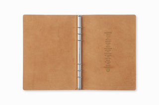 Beige leather A5 6-ring binder open, metal rings centered between covers.