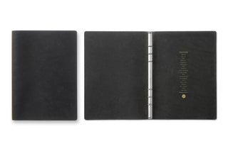 Black A5 leather binder side view showing metal 6-ring spine.