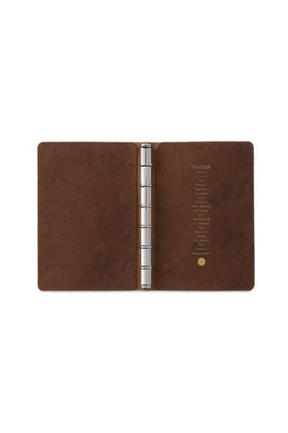 Brown leather mini 6-ring binder, open to metal rings