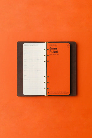 PLOTTER Pueblo 6-ring leather binder opened, showing lined pages and rings