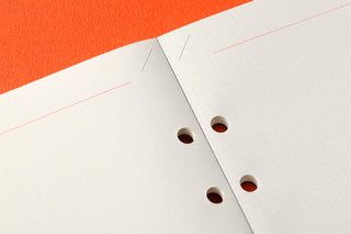 PLOTTER 2mm grid memo pad refill close-up of punched holes on white sheets