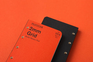 Orange and black PLOTTER 2mm grid refill memo pad covers with punched holes