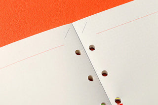 White memo page with red 2mm grid lines and punched binding holes