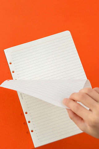 A5 To Do List refill pages with blue-gray lines and punched holes, open view