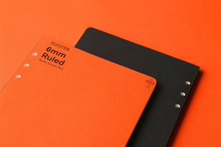 PLOTTER 6mm ruled A5 memo pad refill covers stacked, orange and black with dots