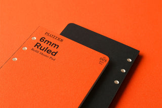 PLOTTER 6mm ruled memo pad refill with black cover, orange label area, punched holes
