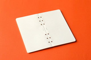 Folded memo pad refill with 6mm ruled pages and punched holes, white paper