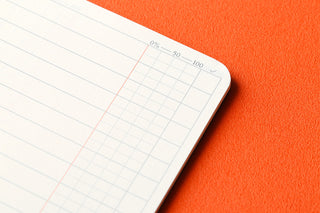 Close-up corner of To Do List refill memo pad with percentage grid scale