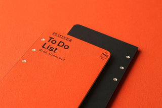 PLOTTER To Do List refill memo pad, orange text on black cover with punched holes