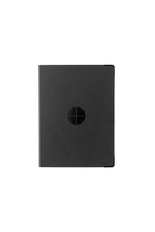 A5 refill storage binder with dark cover and round emblem