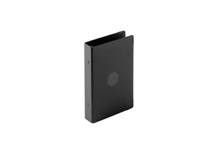 Narrow dark binder with circular logo on cover, side view