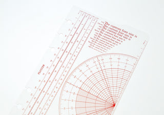 Overlapping Bible-size ruler pad templates with printed measurement lines and text