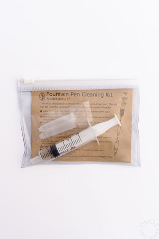 Fountain pen cleaning kit with clear zip pouch and white cleaning cartridges