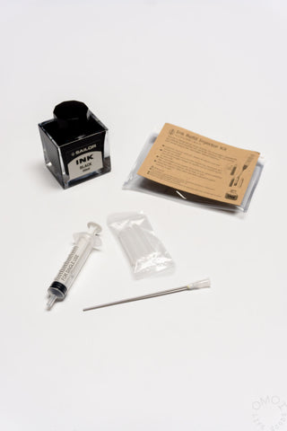 POINT ink cartridge refill kit components: black injector box, card, syringe, needle