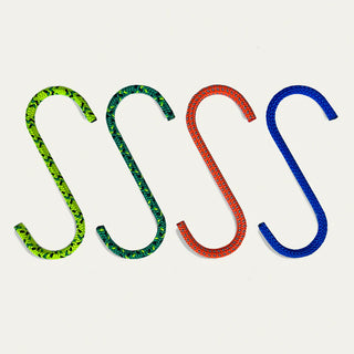 Mixed bright S-hook cords in green, orange, and blue, close-up