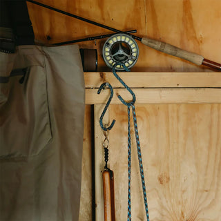 Blue braided cord S-hooks with metal keyrings, hanging on a rail