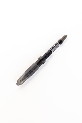 Pentel Tradio marker with dark body and chisel tip in profile view