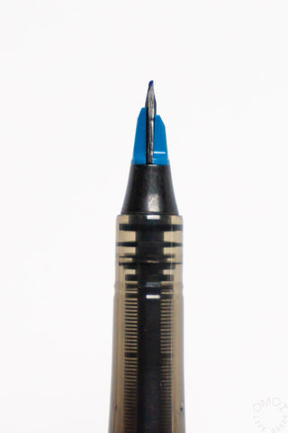 Pentel Tradio marker with close-up blue ink nib on black barrel