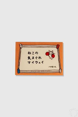 Orange cat mini memo pad with framed cartoon cat and handwritten-style characters