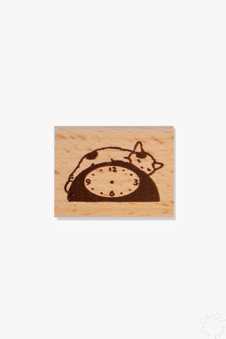 Small wooden stamp clock with cat face illustration