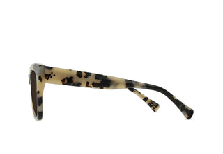 Ivory tortoise sunglasses with dark lenses, side profile