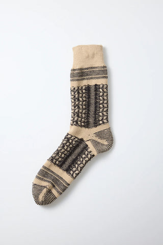 Crew socks with desert-style knit pattern in light beige and dark brown, ribbed cuff