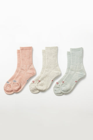Set of mini crew socks in salmon, light gray, and light blue; ribbed knit.
