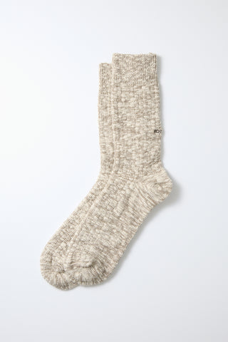 Mocha slub-knit crew sock with ribbed cuff and knitted textured shaft