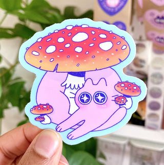 Cute cartoon mushroom sticker with pink cap, blue outline, and tiny mushroom accents