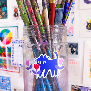 Blue Kuni tulip character stickers on a clear cup