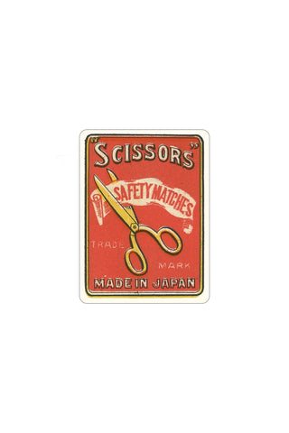 Vintage red scissors sticker with gold scissors illustration and 'SCISSORS' text