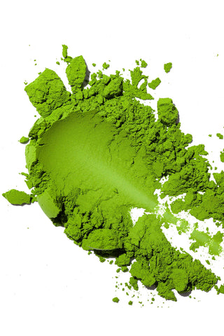 Ceremonial matcha powder, bright green loose powder pile