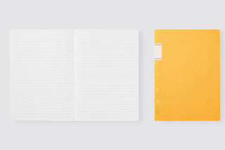 STÁLOGY 016 B5 notebook, open lined pages with yellow cover