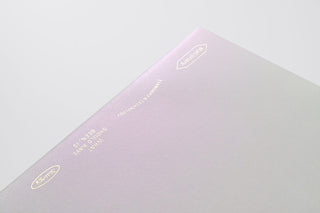STÁLOGY A5 editor's notebook with light lavender cover and gold foil text