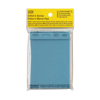 STÁLOGY memo pad in plastic wrap, blue cover with yellow label
