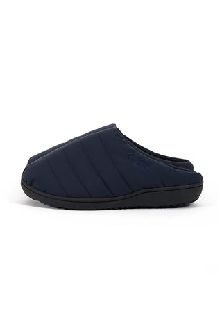 Navy slip-on outdoor slippers with quilted panels and black sole