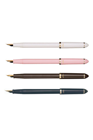 Set of four fountain pens: pearl white, pearl pink, pearl brown, dark blue, gold tips