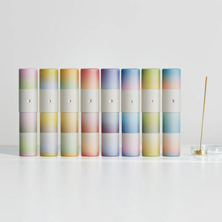 Set of gradient incense canisters in pastel tones, with incense sticks and tips