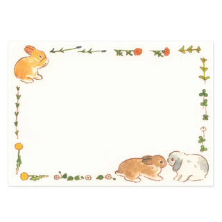 Illustrated letter card with rabbits and floral border, blank center, light background
