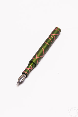 Pocket 6 fountain pen in green with salmon splash anodized aluminum, pointed nib