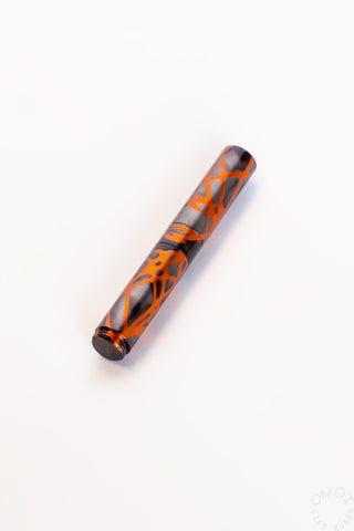 Orange smoke marbled fountain pen with metallic clip and pointed nib