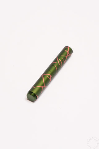 Pocket 6 fountain pen, green anodized aluminum with salmon splash pattern (no nib visible)