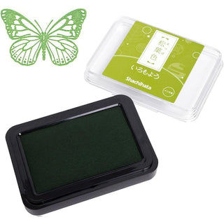 Large stamp ink pad with dark green ink and clear lid, black plastic base