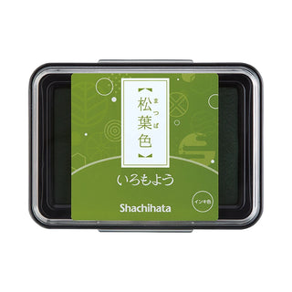 Shachihata large stamp ink pad in light green, inside a black-framed container